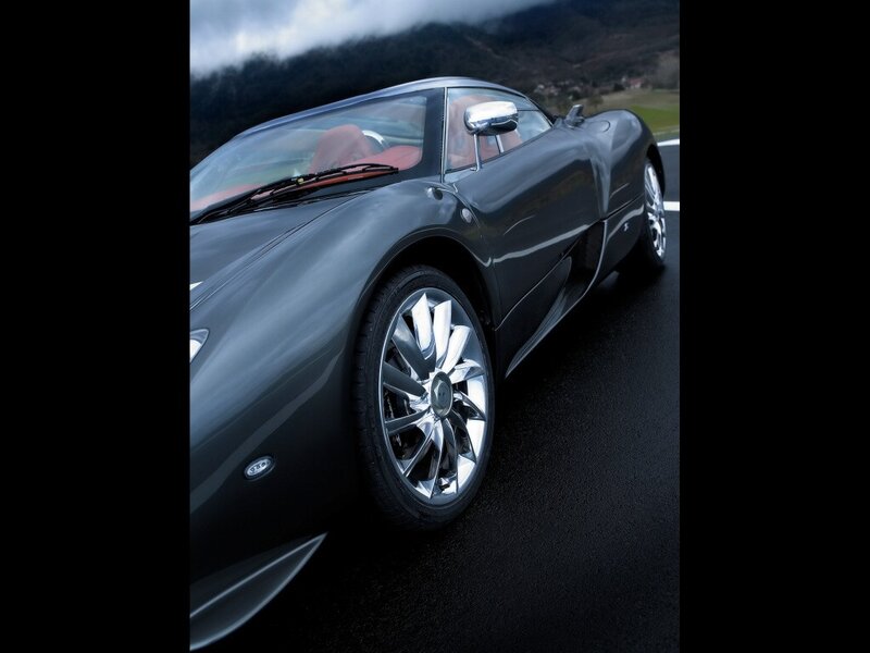 Black sports car on a road