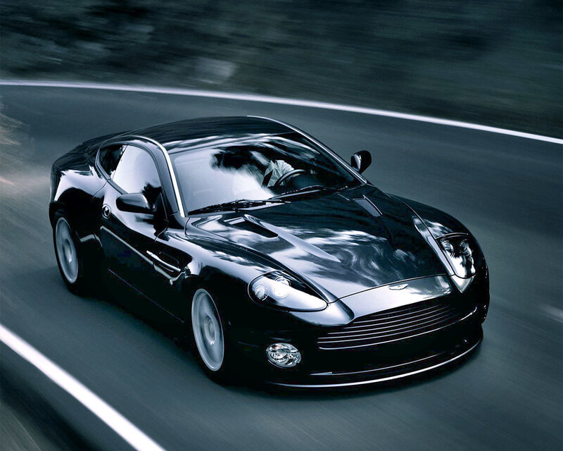 Black sports car on a road