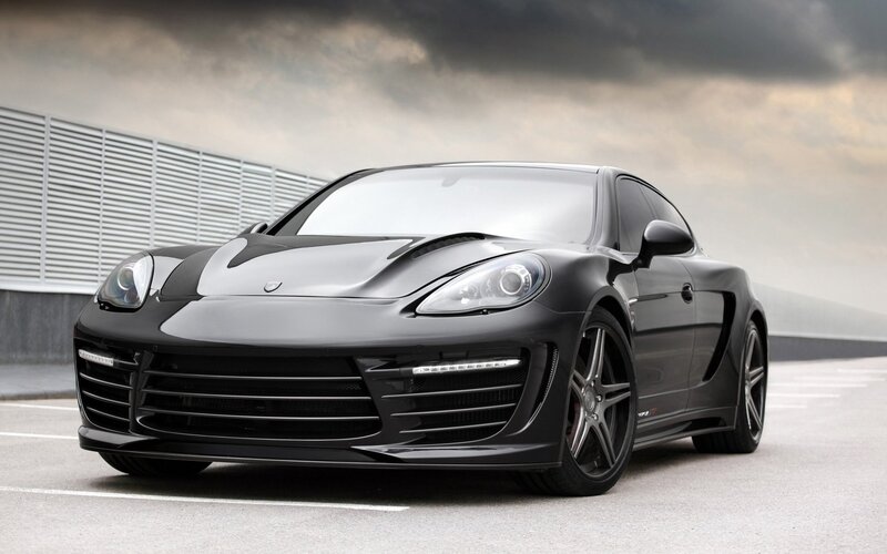 Black sports car on a rooftop
