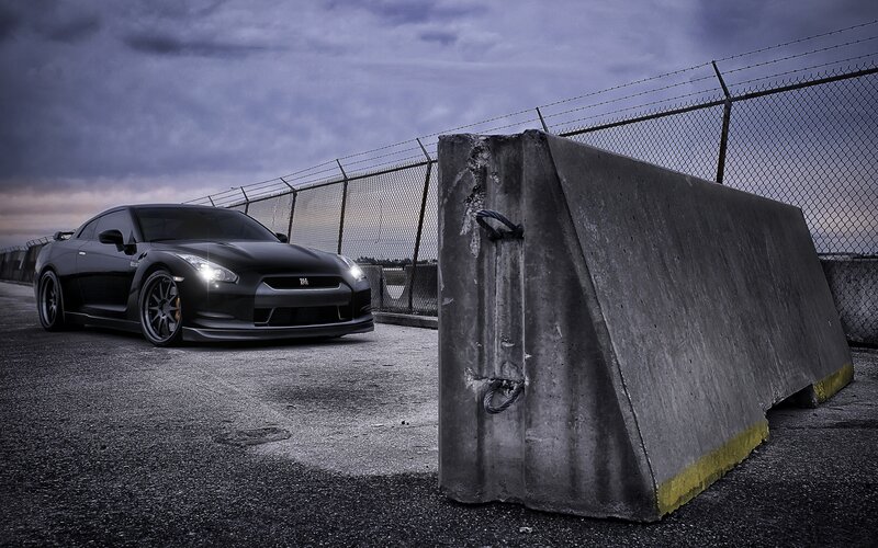 Black sports car on a track