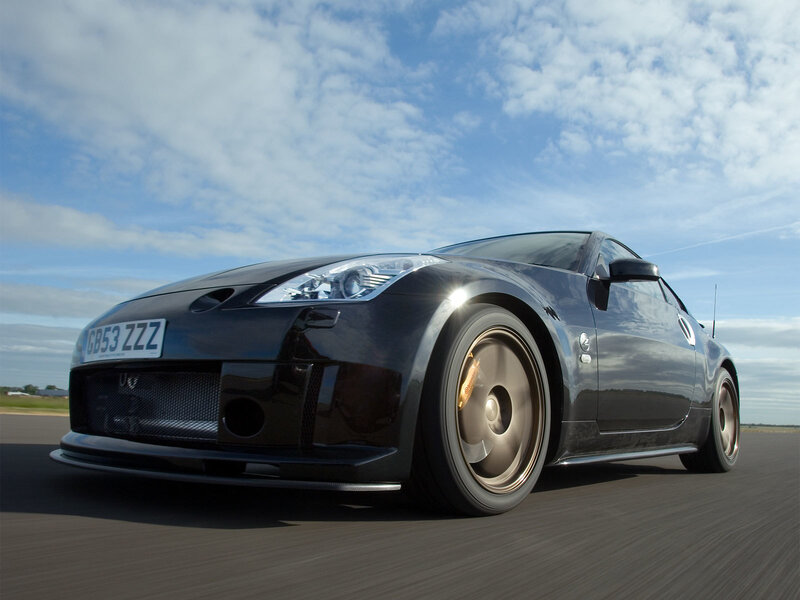 Black sports car on a track