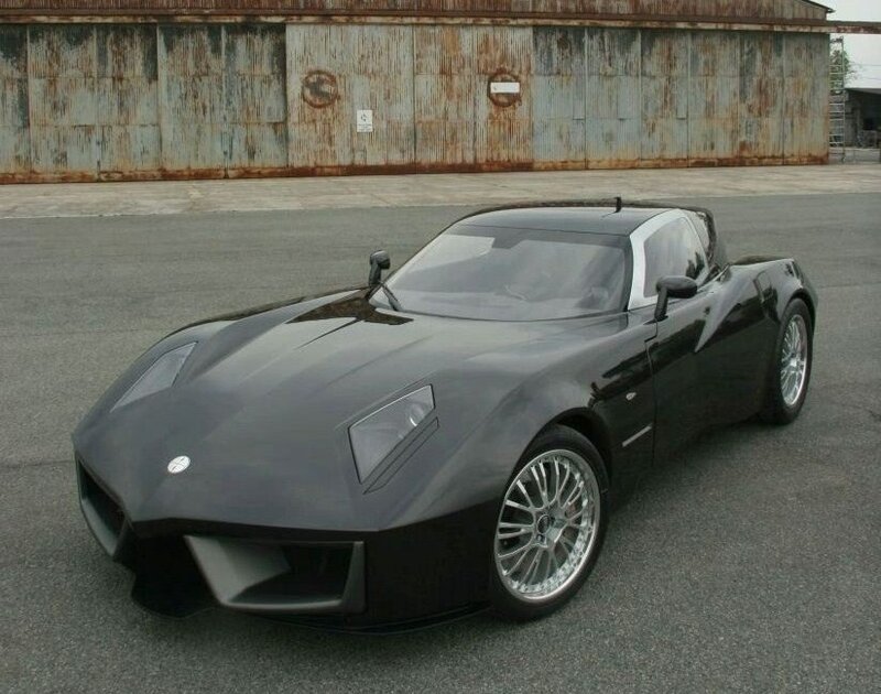 black sports car on asphalt