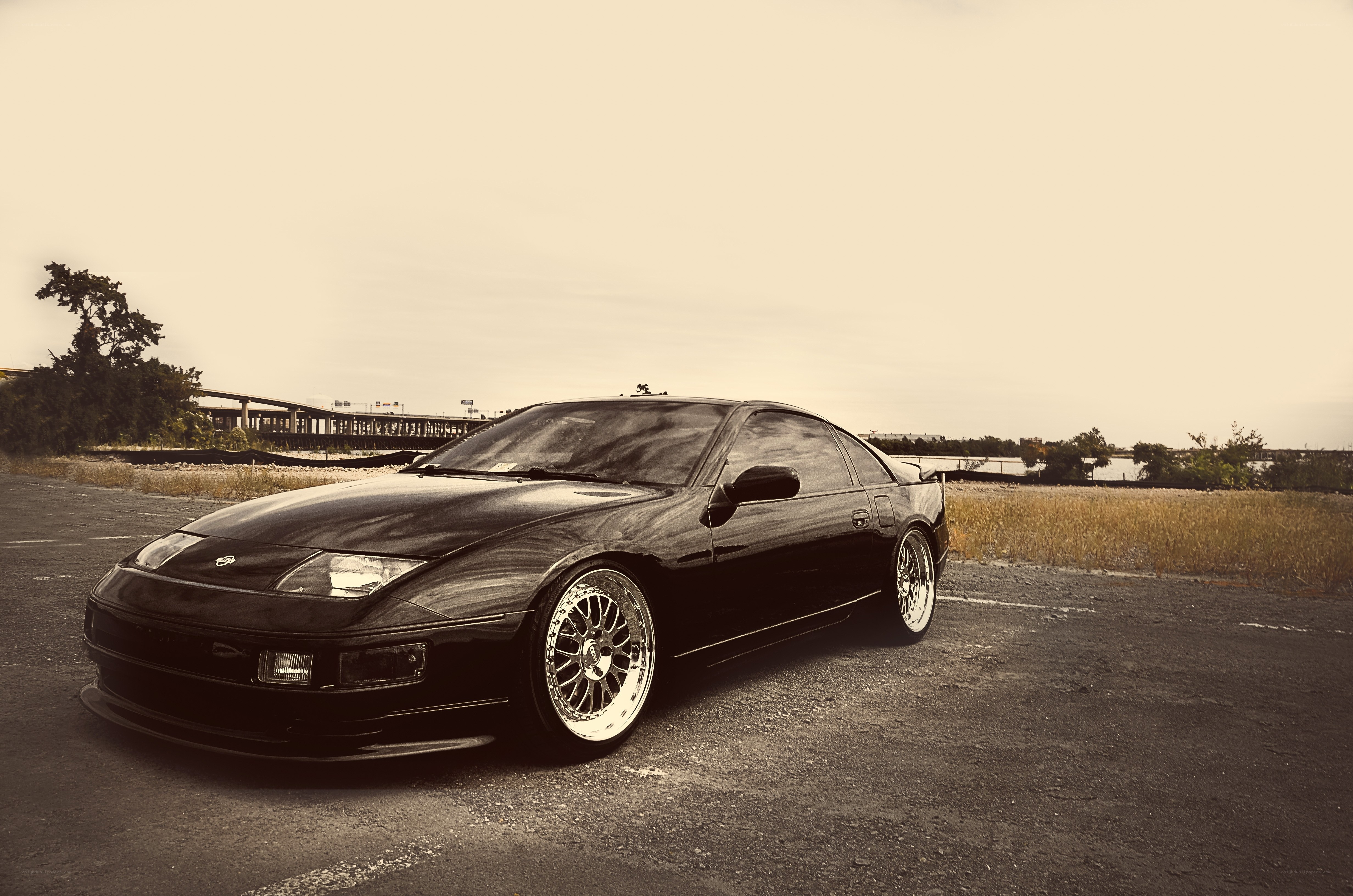 Black sports car on asphalt