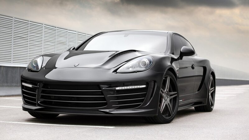 black sports car on asphalt