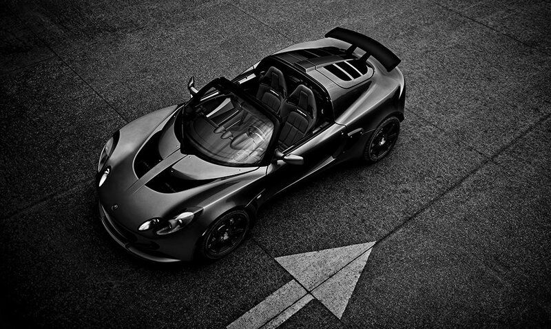 Black sports car on asphalt