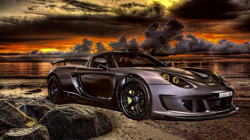 Black Sports Car on Beach — Dramatic, Sunset