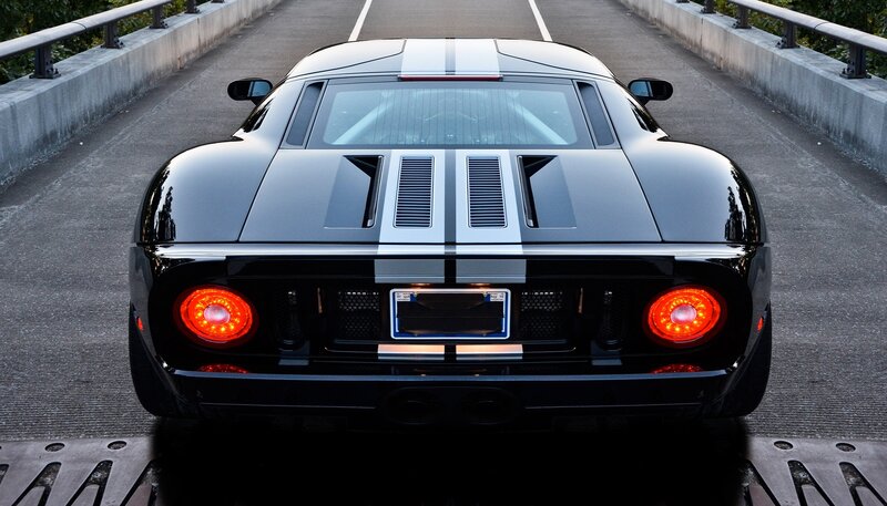 black sports car on bridge