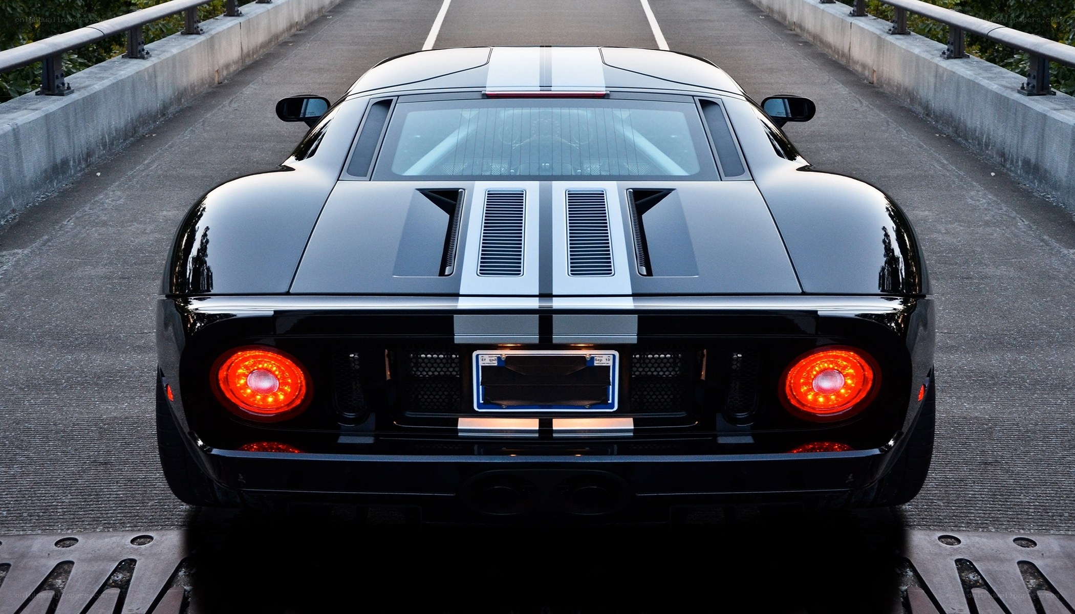 black sports car on bridge