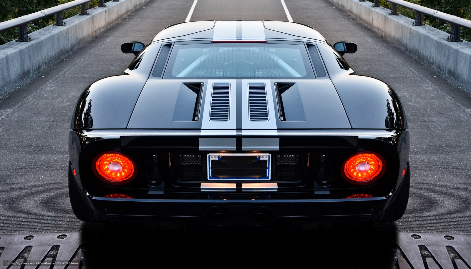 black sports car on bridge