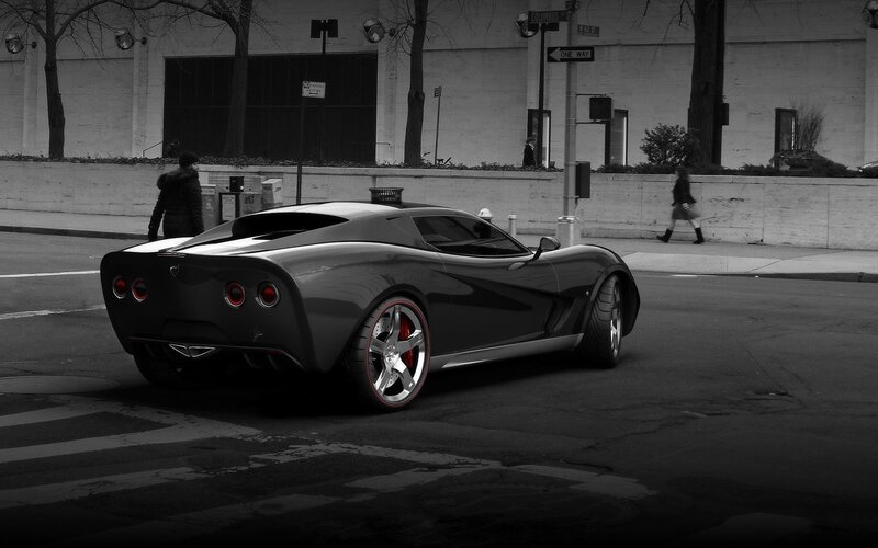 Black sports car on city street