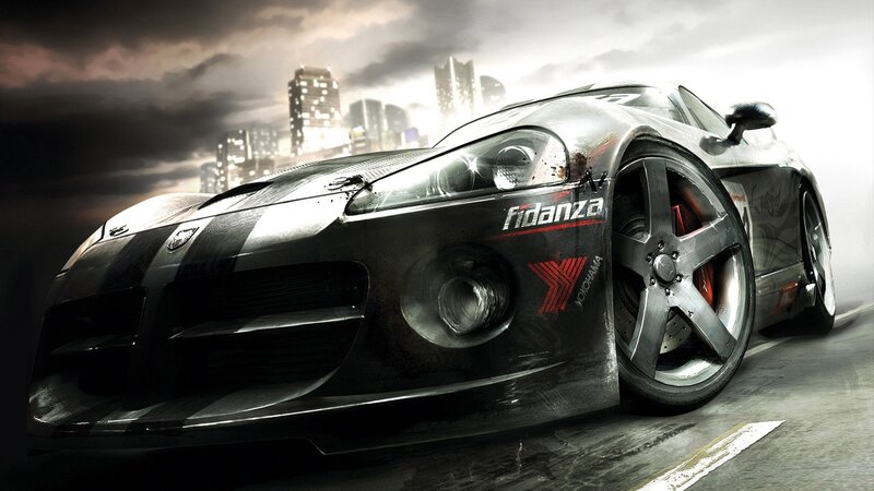 black sports car on city street
