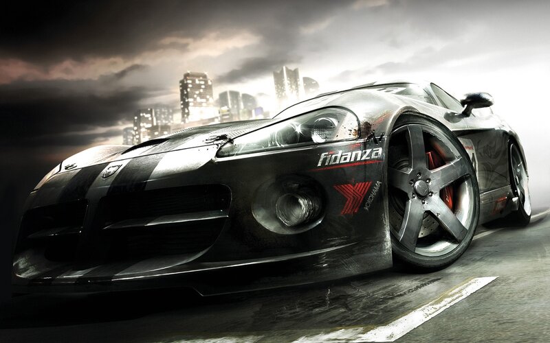 black sports car on city street