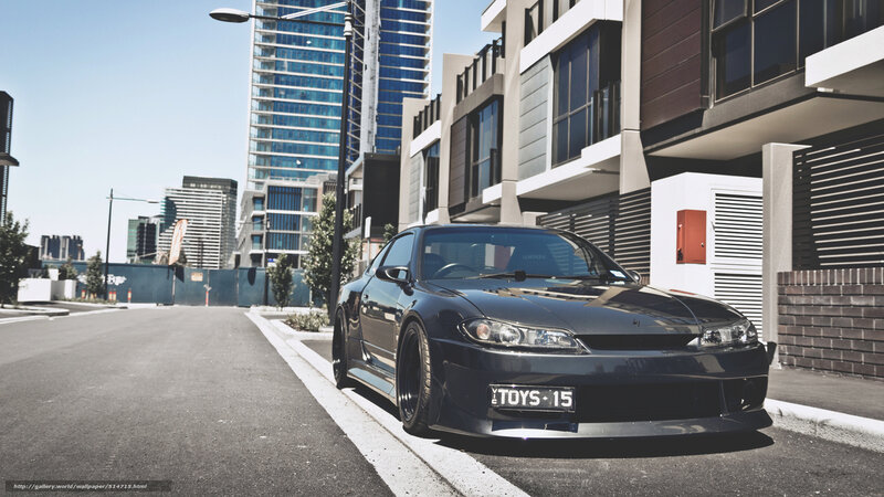 black sports car on city street