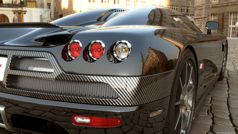 black sports car on cobblestone