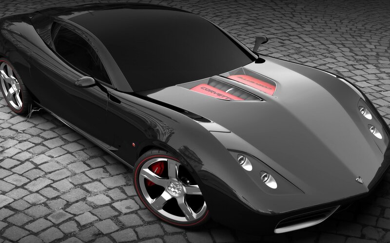 Black sports car on cobblestones