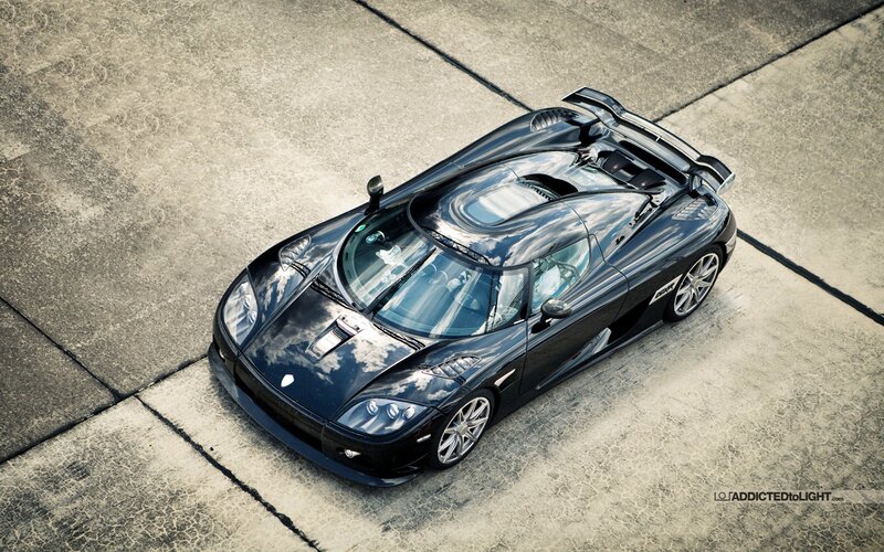 black sports car on concrete