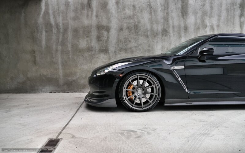 Black sports car on concrete