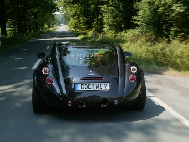 black sports car on country road