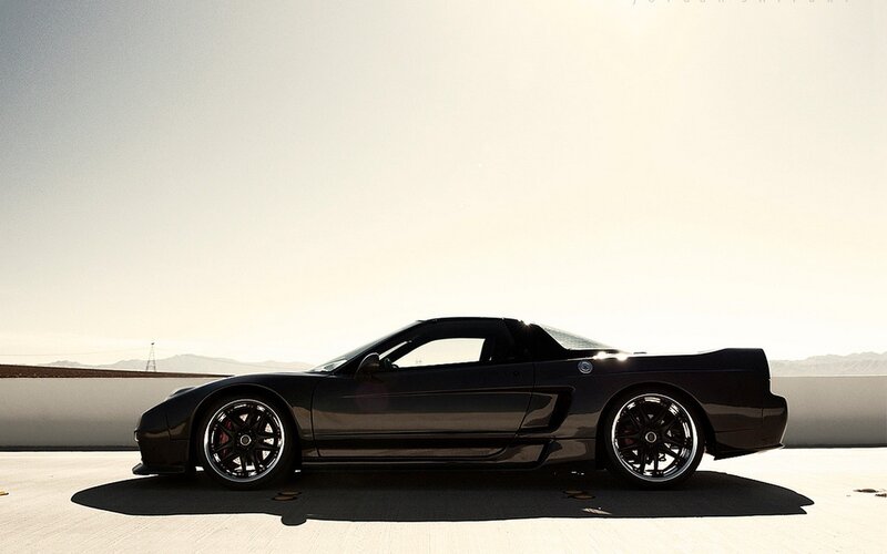 black sports car on desert road