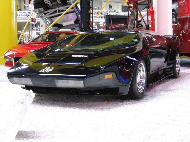 Black sports car on display