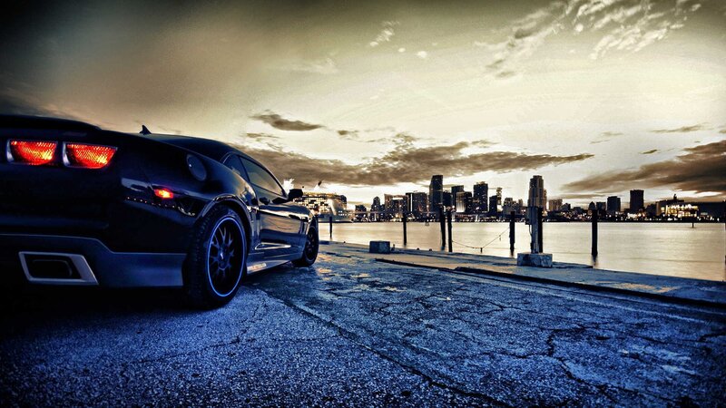 Black Sports Car on Dock