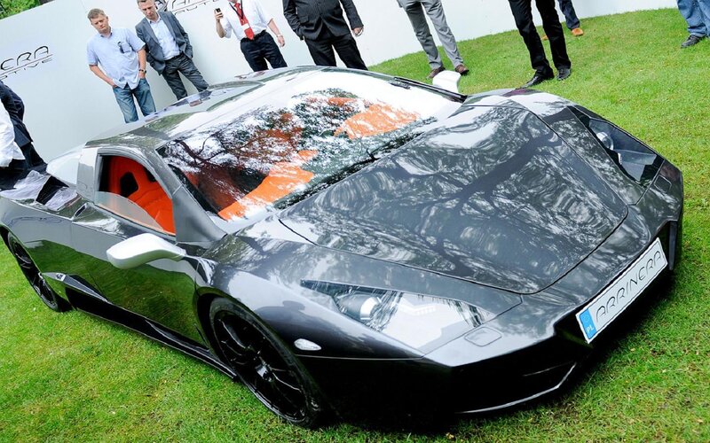 Black Sports Car on Grass — Calm