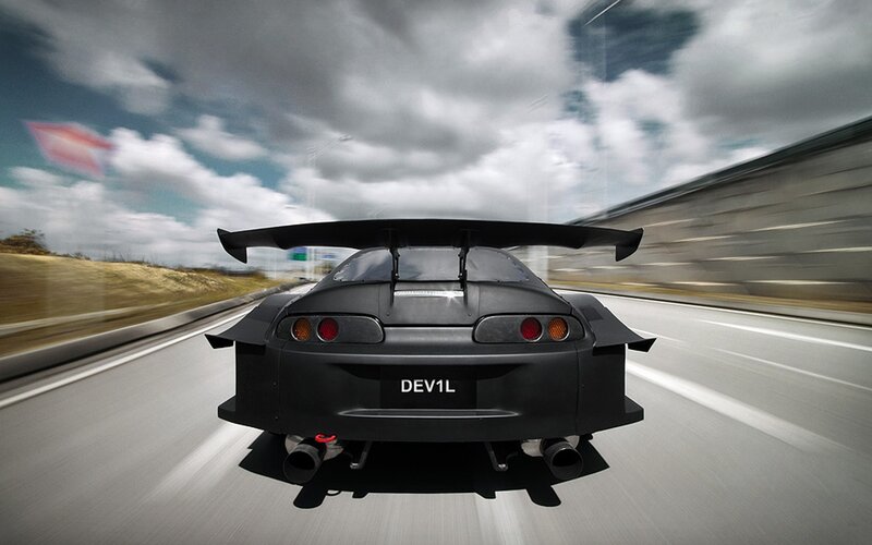 black sports car on highway