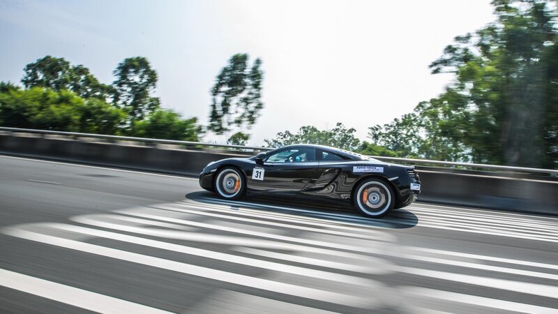 black sports car on highway
