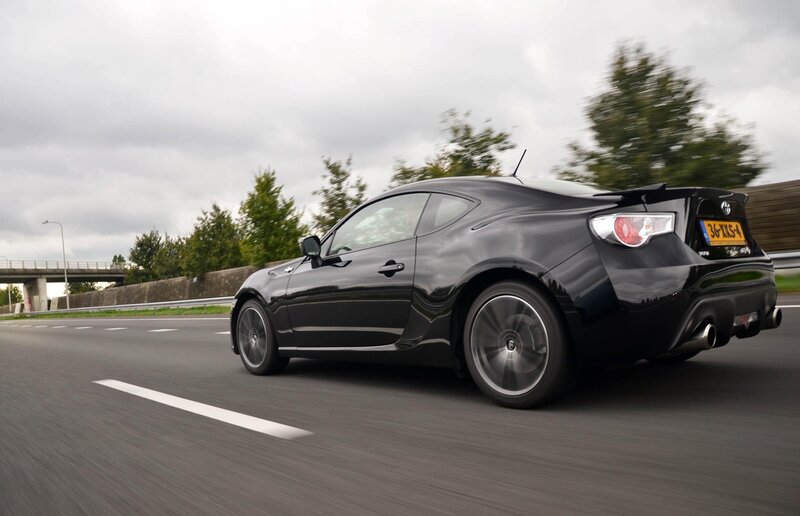black sports car on highway