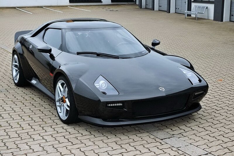 black sports car on pavement