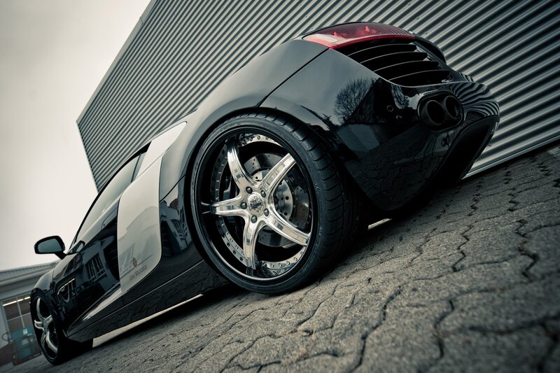 black sports car on pavement