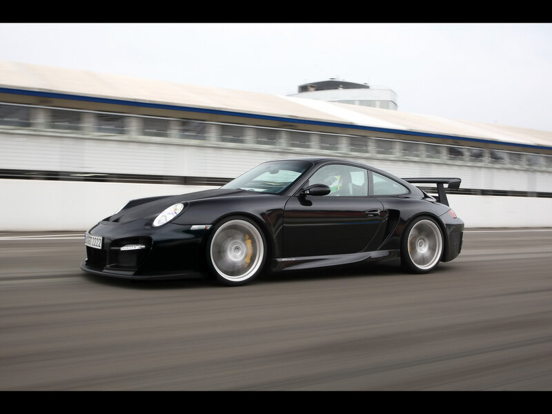 black sports car on racetrack