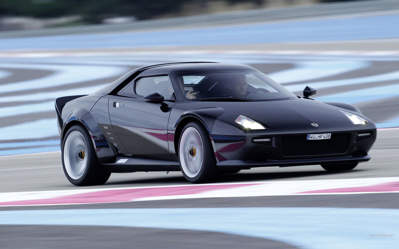 black sports car on racetrack