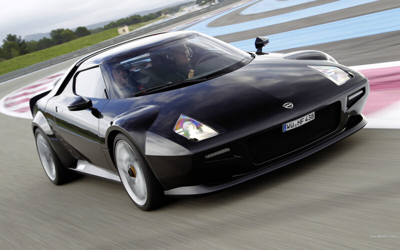 black sports car on racetrack