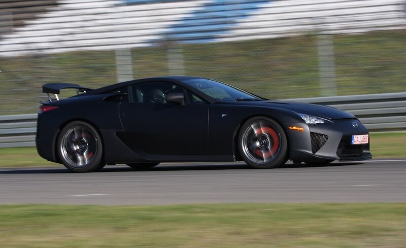 black sports car on racetrack