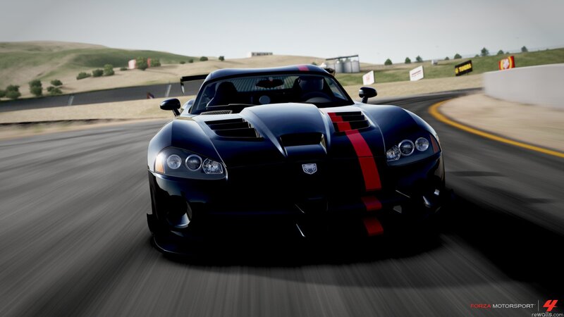 black sports car on racetrack