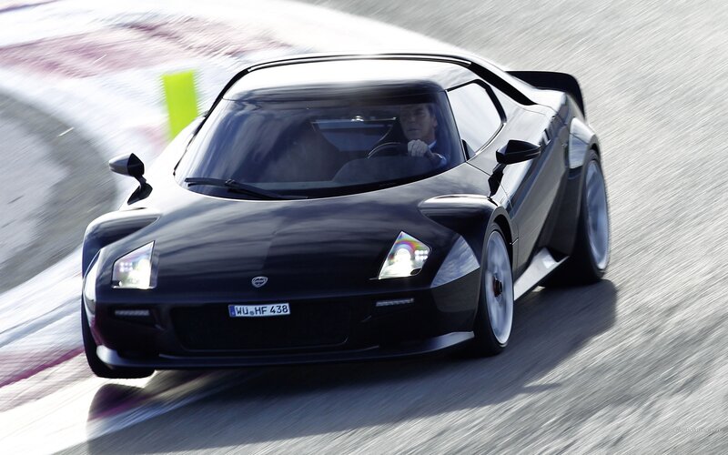 black sports car on racetrack