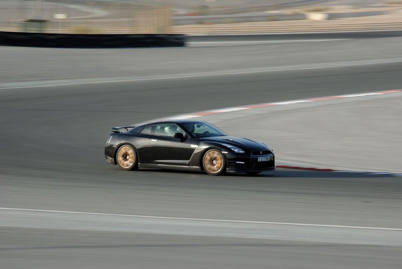 Black sports car on racetrack