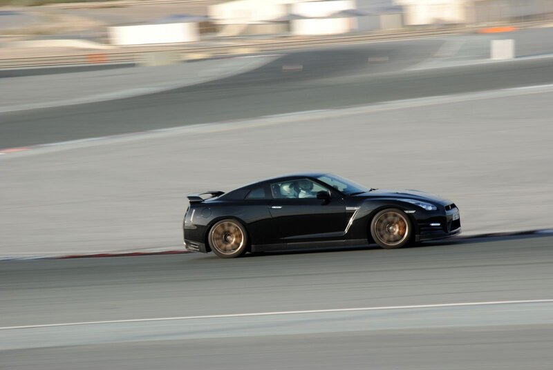 Black sports car on racetrack
