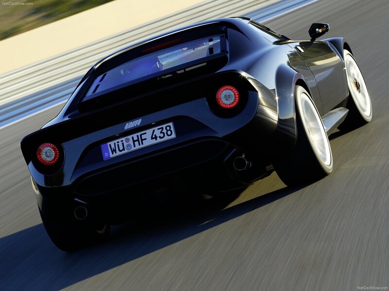 black sports car on racetrack