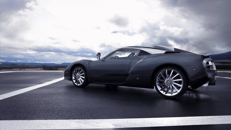 black sports car on racetrack
