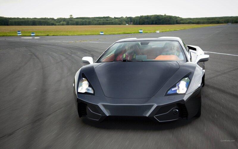 black sports car on racetrack