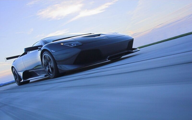 black sports car on racetrack