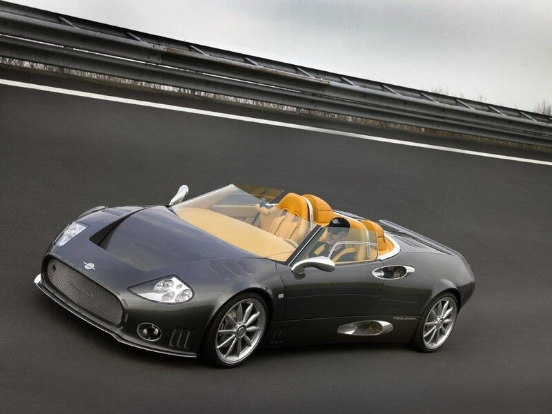 black sports car on racetrack