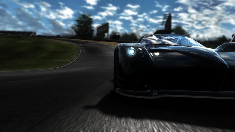 black sports car on racetrack