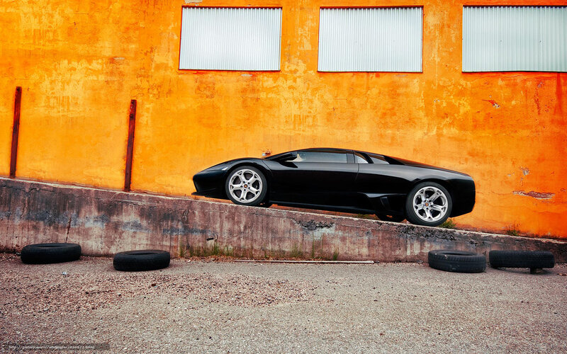 Black sports car on ramp