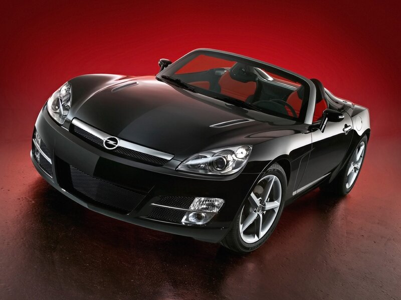 black sports car on red