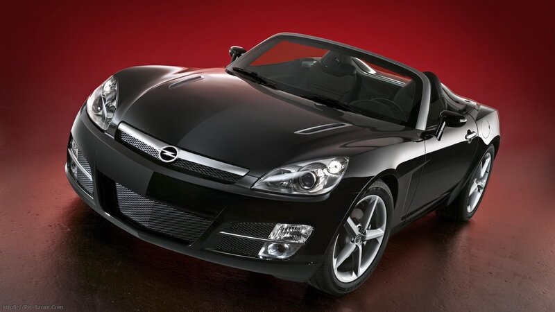 black sports car on red background