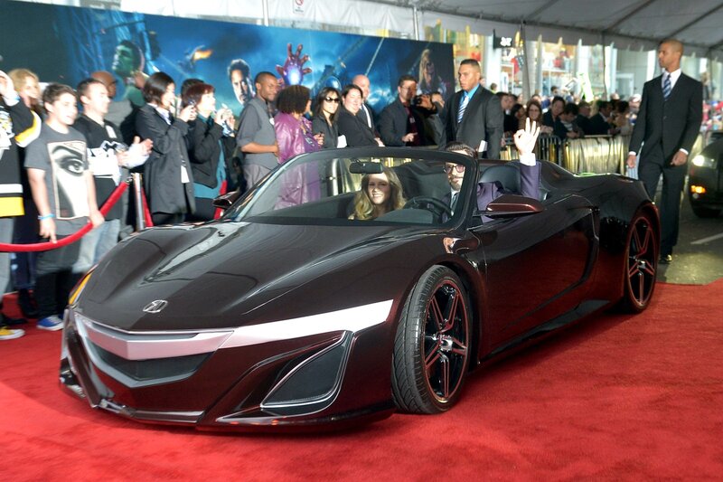 Black Sports Car on Red Carpet