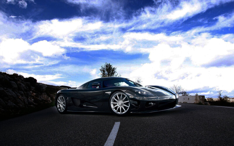 black sports car on road